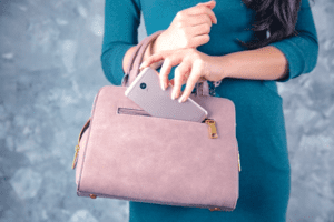 Woman holding a pink purse